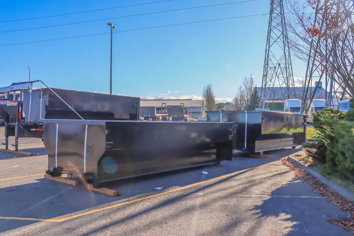 Roll-off dumpster ready for waste disposal at job site for Concrete Dumpster Rental in Middlebury